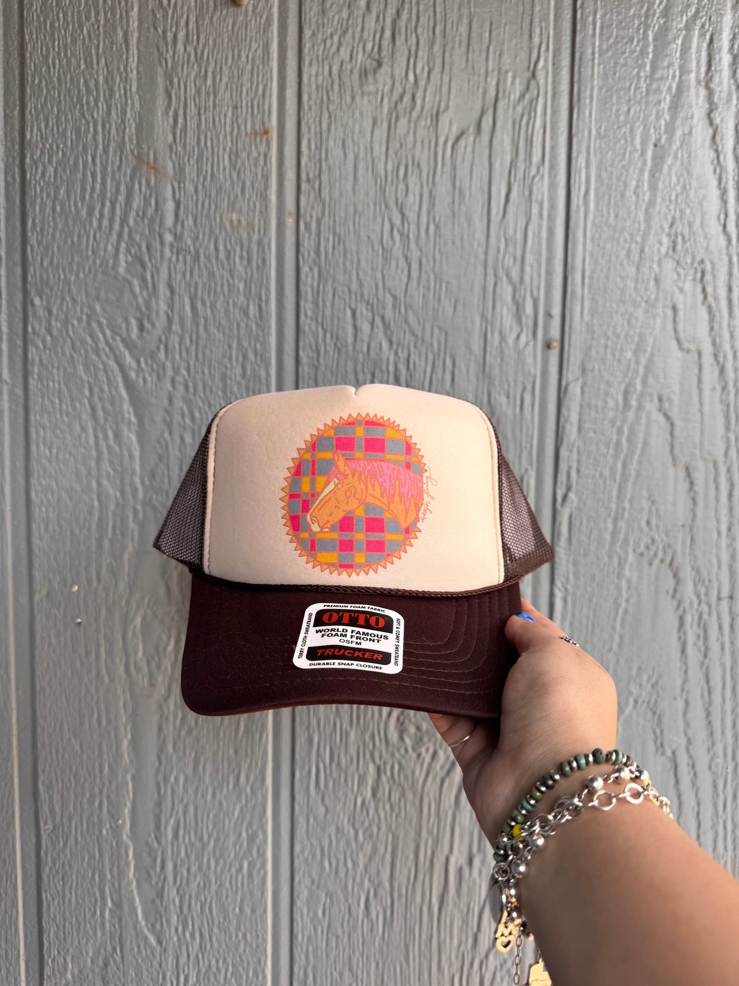 Plaid pony trucker hat