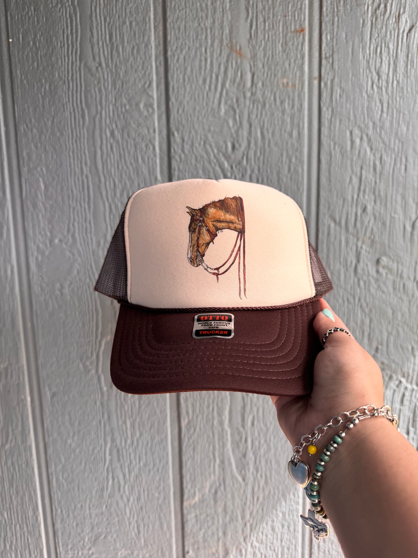 Brown on brown horse trucker hat