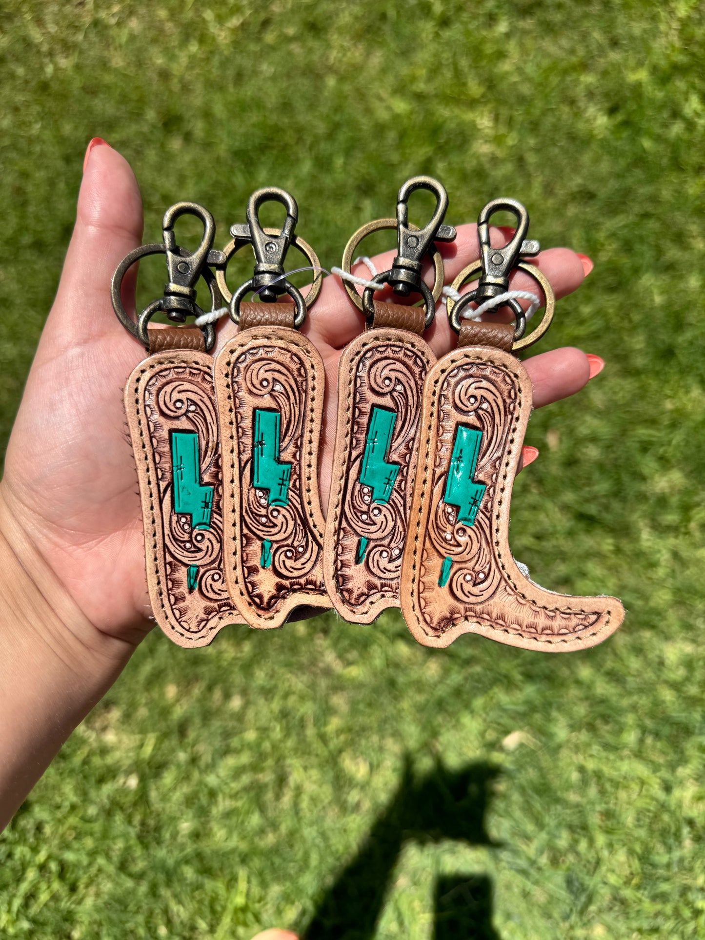 Boot key chains tooled and hide