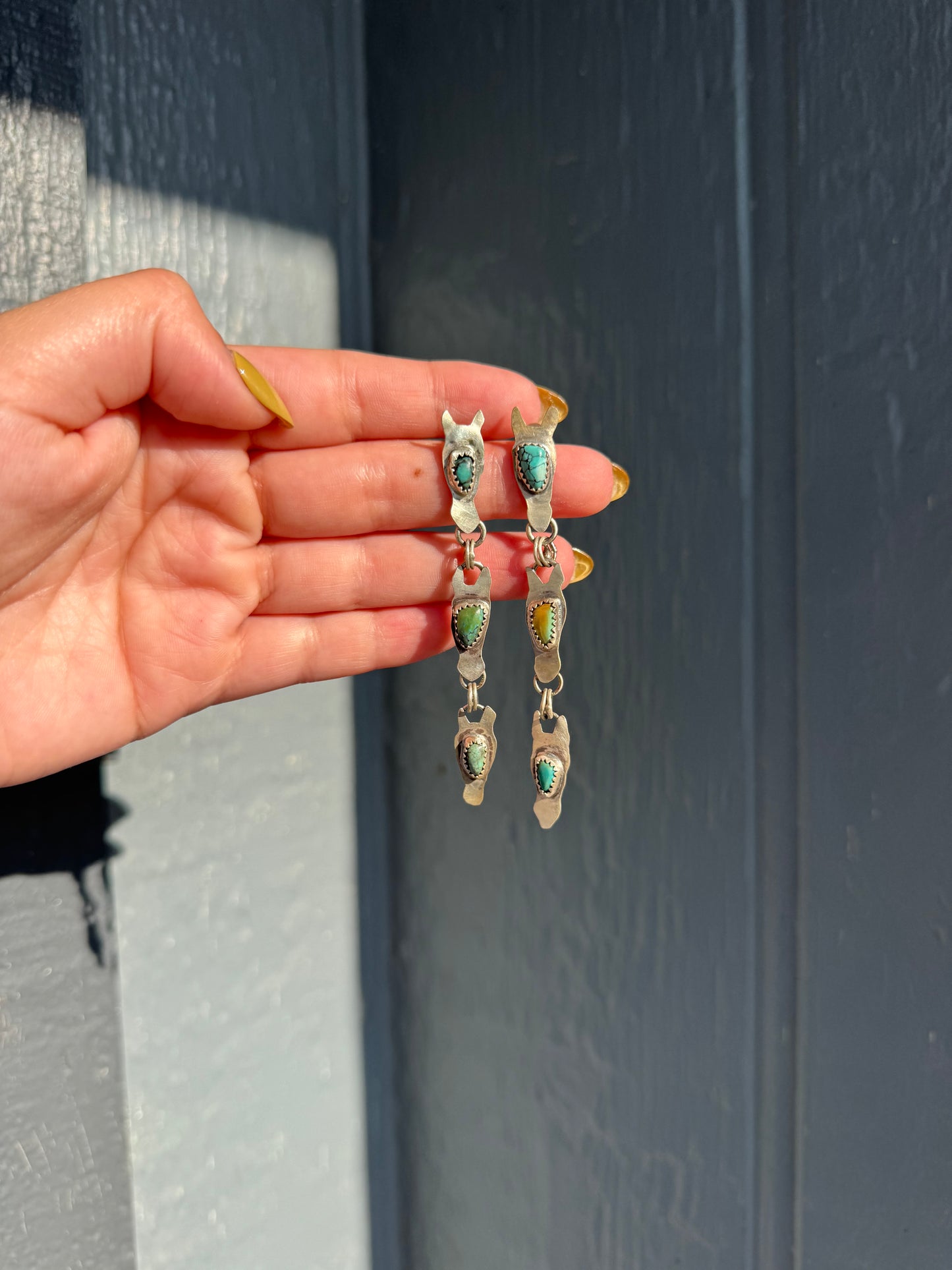 Horse head dangle earrings