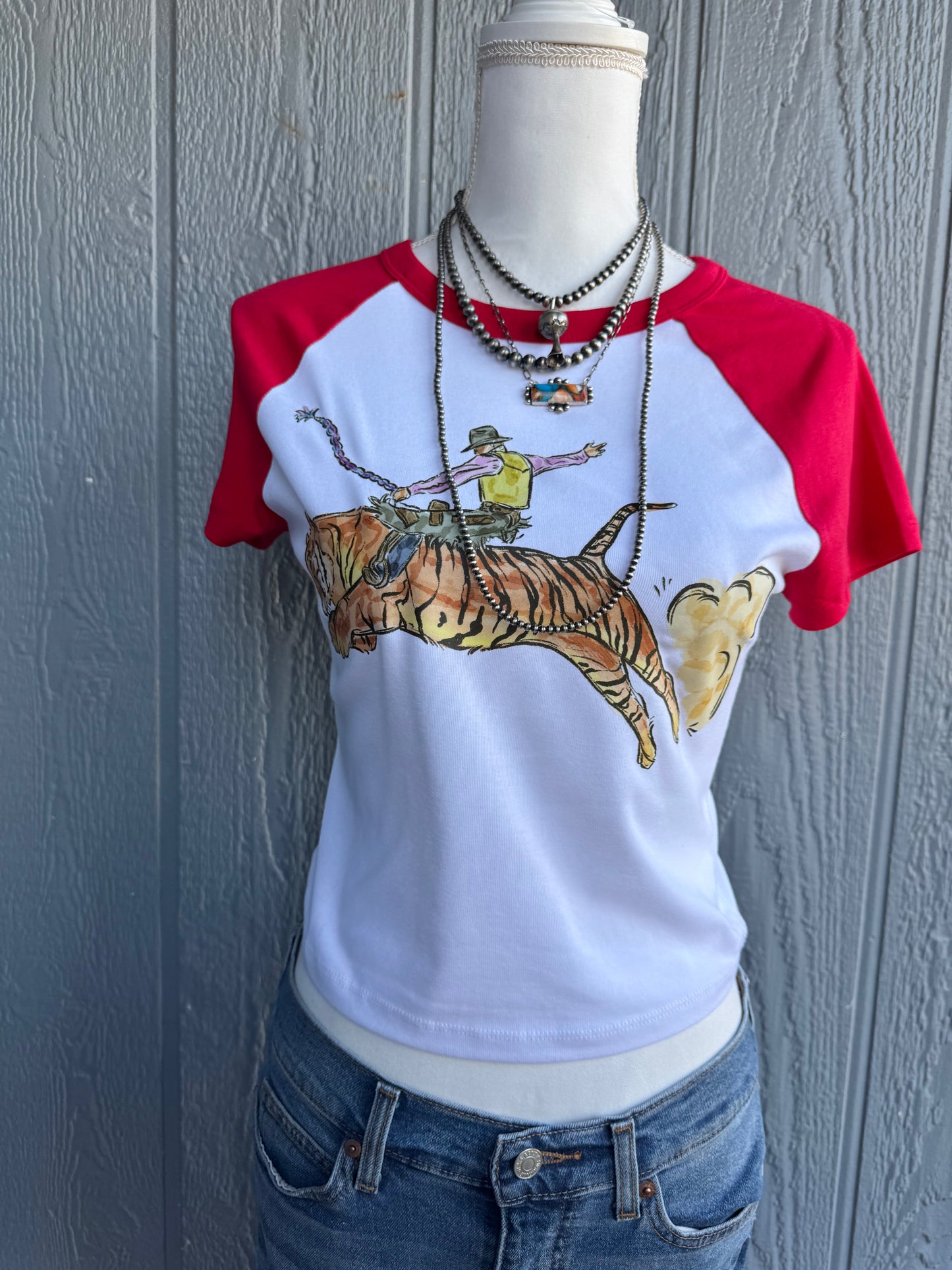 Tall tails and tiger stripes Top